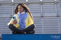 South Yorkshire, Woman with headphones looking at smart phone