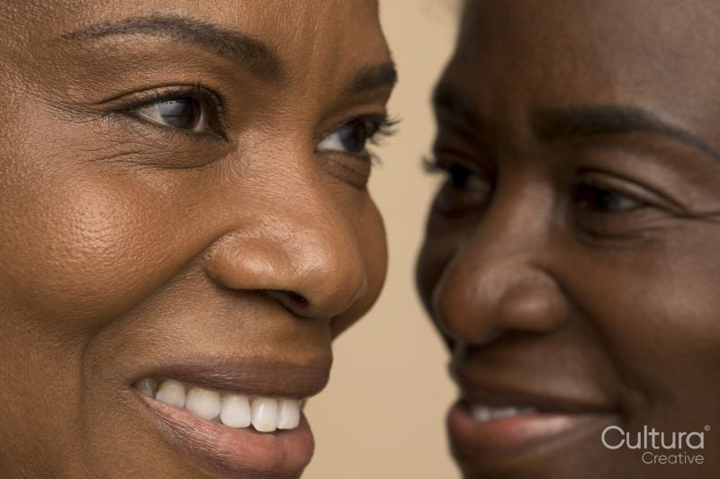 Close-up of two smiling women