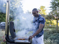 Man grilling on barbecue grill