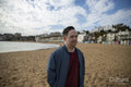 Mid adult man on beach