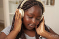 Girl in headphones listening to music