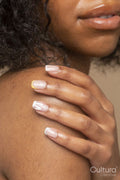 Close-up of woman touching shoulder