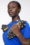 Studio portrait of woman with soccer shoes