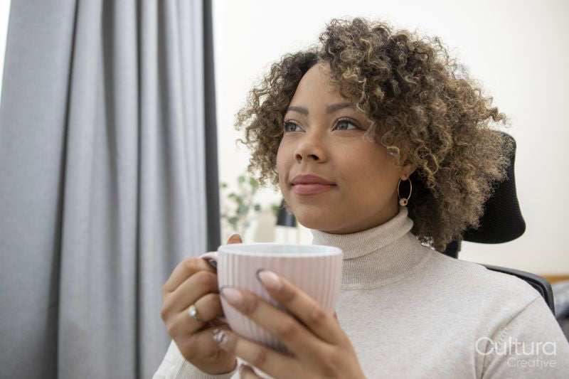 Woman having coffee break