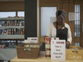 Volunteer working in community food center