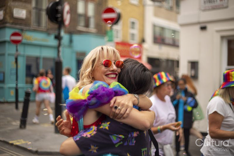 Two women hugging at London Pride