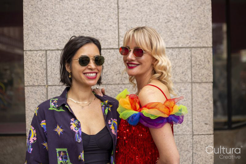 Portrait of two mid adult women wearing sunglasses
