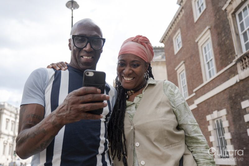 Happy mature couple visiting city