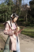 Young woman using phone in park