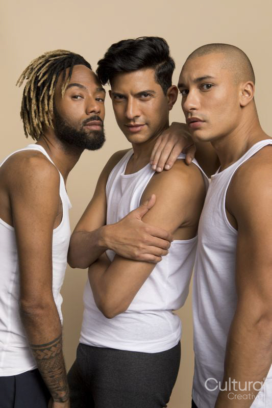 Studio portrait of men in white tank tops