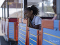 Girl on land train tourist ride