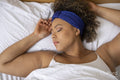 Woman sleeping in bed