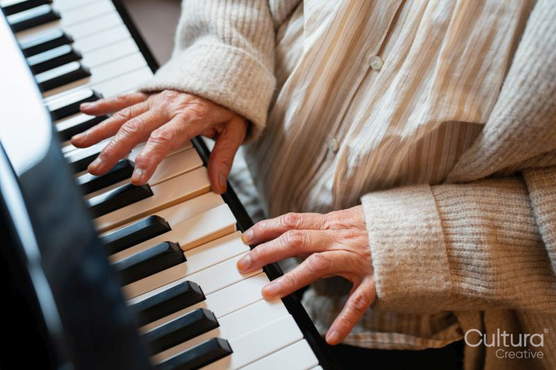 Senior woman playing piano