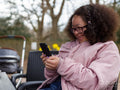 Girl holding mobile phone