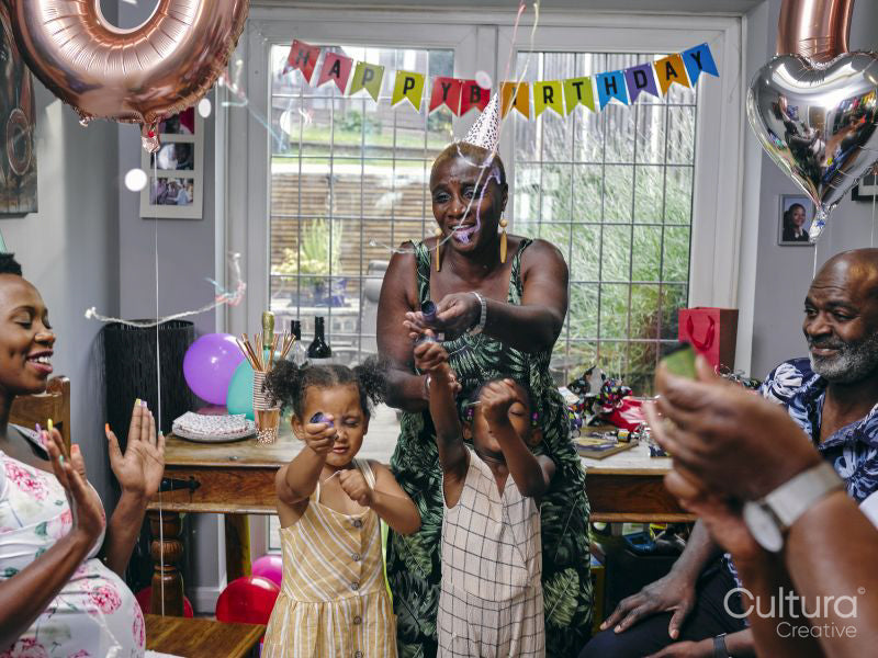 Family having fun at birthday party
