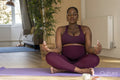 Pregnant woman practicing yoga