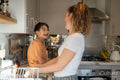 Mother and son in kitchen