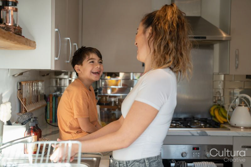 Mother and son in kitchen