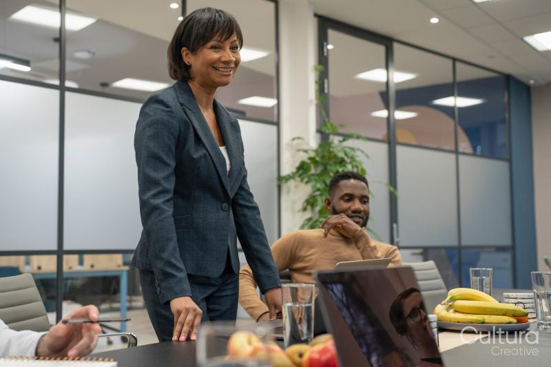 Mature businesswoman leading business meeting