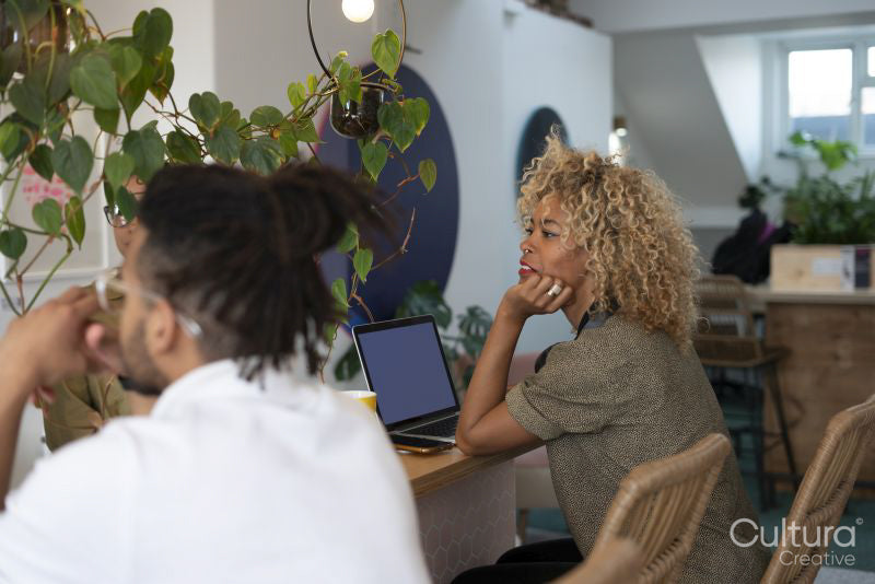 Creative professionals working in office