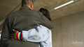 Rear view of two women embracing