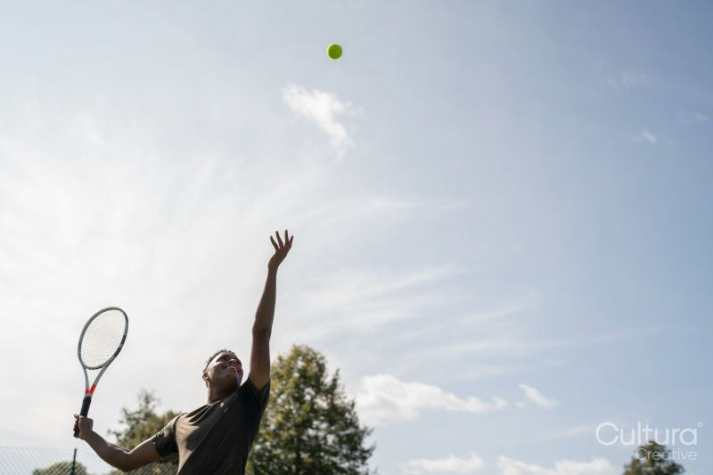Low angle view of man playing tennis