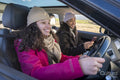 Female friends traveling by car