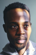 Portrait of mid adult man in sweatshirt