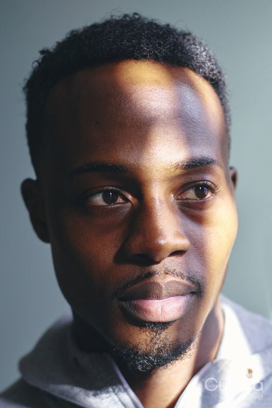 Portrait of mid adult man in sweatshirt