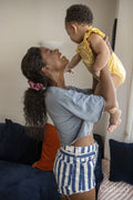 Mother with baby daughter at home