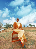 Fashion shot of young woman in savanna