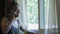 Smiling senior woman talking on phone