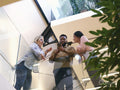 Low angle view of coworkers in office corridor