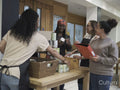 Female volunteers working in community food center