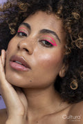 Portrait of woman with pink makeup