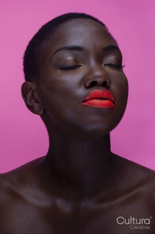 Beauty portrait of a model wearing red lipstick