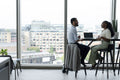 Business people having meeting in modern office