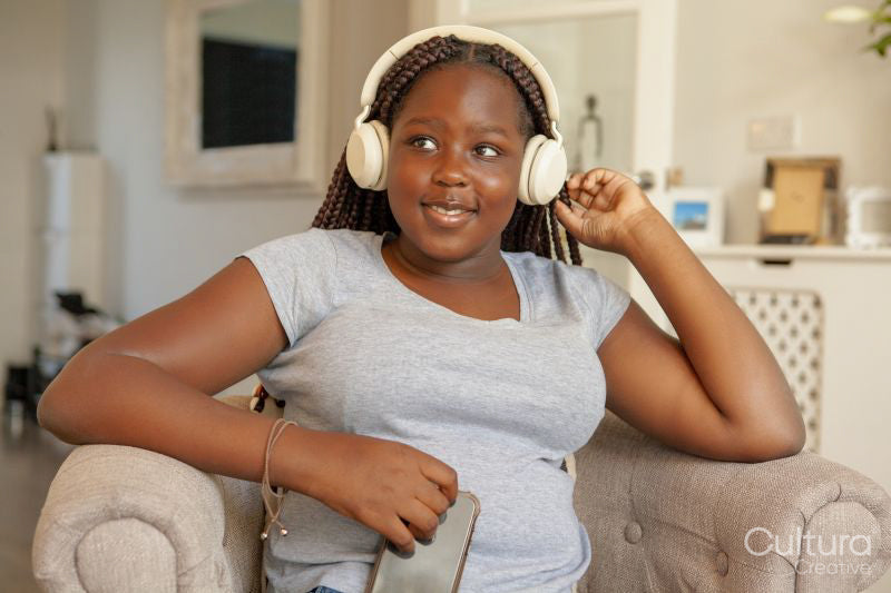 Smiling girl in headphones