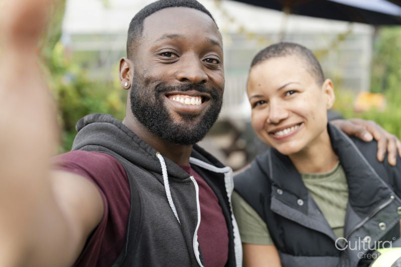 Portrait of smiling couple in allotment