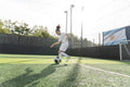 Girl playing soccer on soccer field