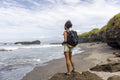Indonesia, Bali, Female tourist looking at sea view