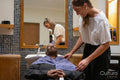 Smiling senior woman and hairdresser in hair salon